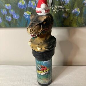 1997 UNIVERSAL STUDIOS JURASSIC PARK T-REX SOUVENIR CUP LTD WITH SANTA HAT